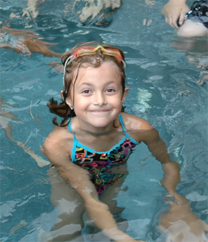 Girl Smiling and Swimming